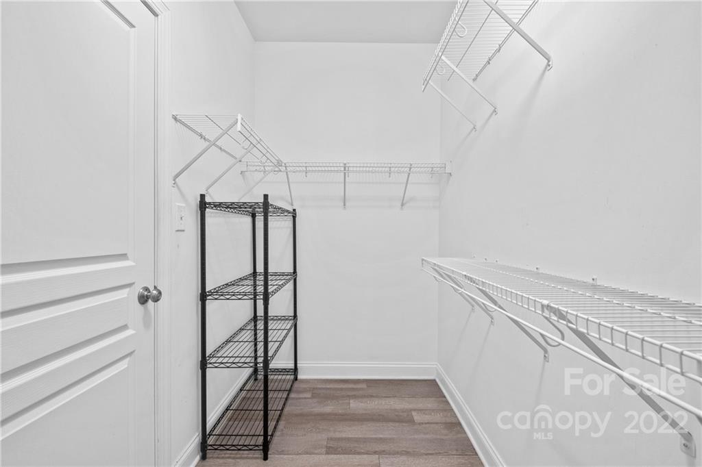 402 Ellicott Lane Locust, NC 28097 - Photo 24 of 41 a view of a room with racks on the wall