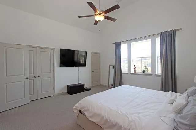 a bathroom with a shower and a sink