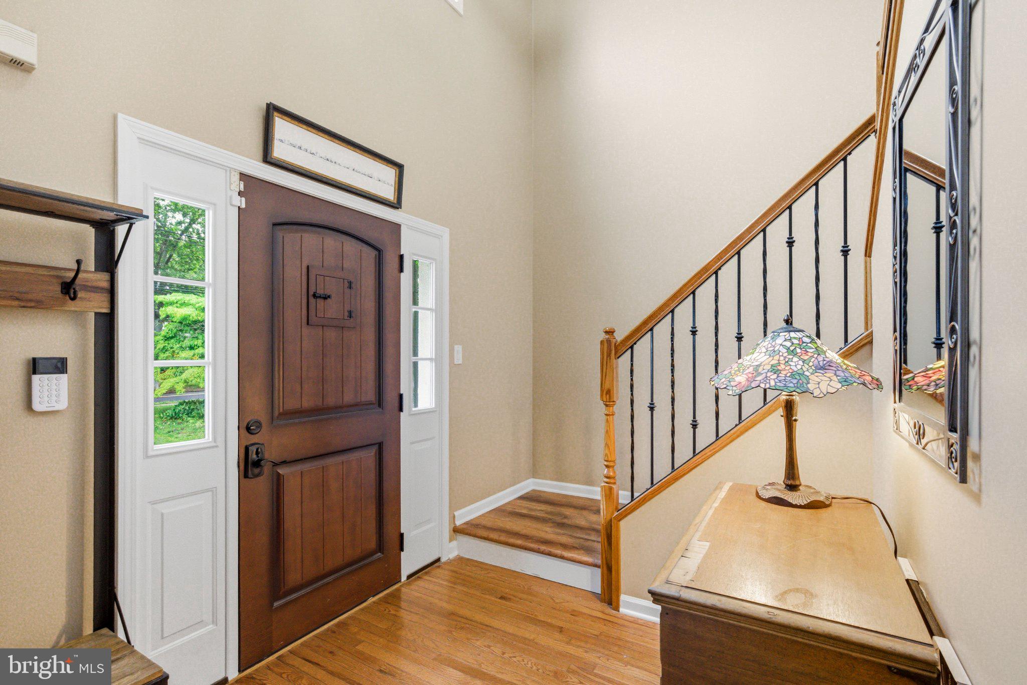 706 Main Street Riverton, NJ 08077 - Photo 5 of 44 Welcoming entry with elegant staircase.
