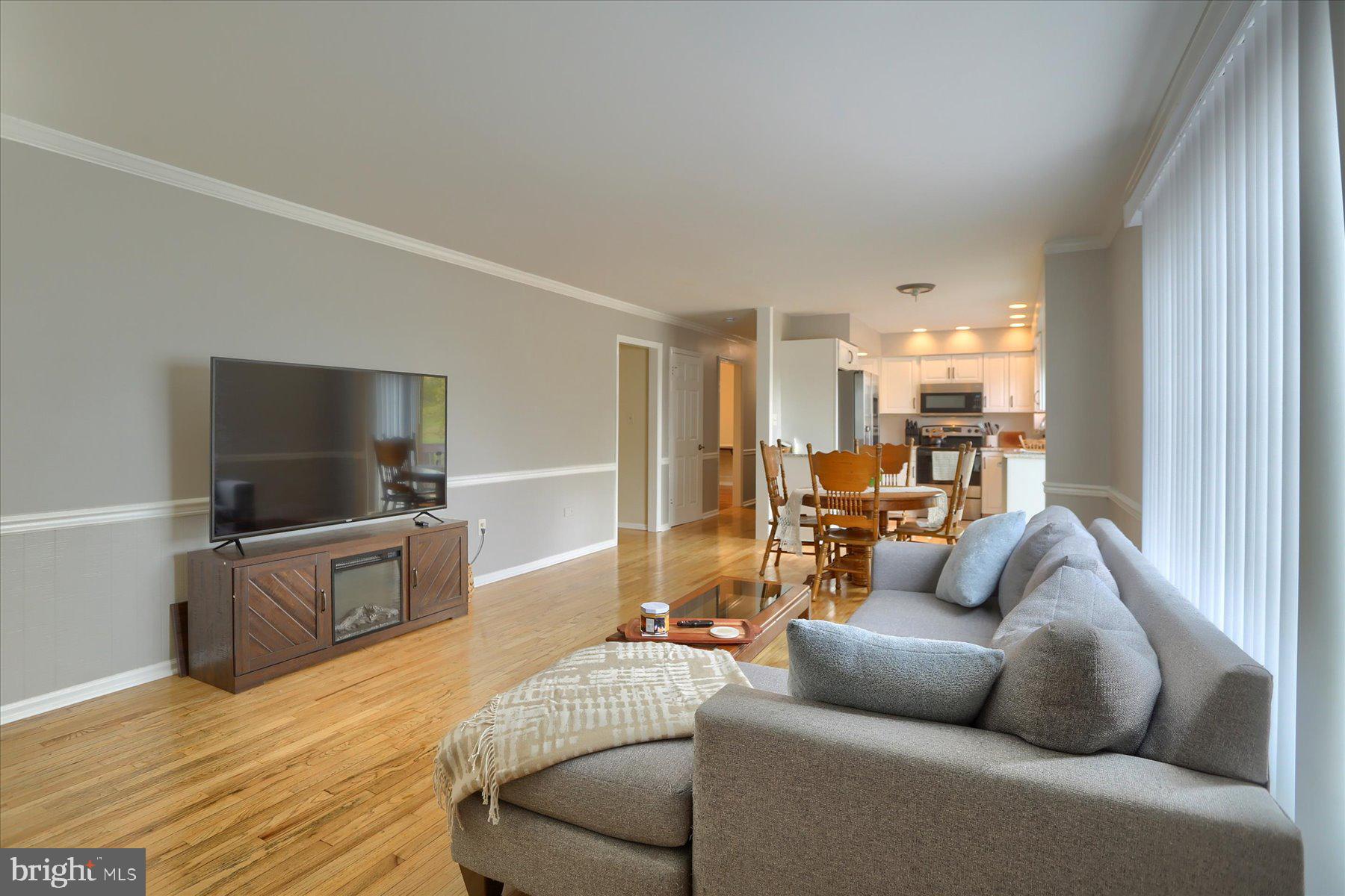 3704 Reichert Road Harrisburg, PA 17110 - Photo 13 of 44 a living room with furniture and a flat screen tv