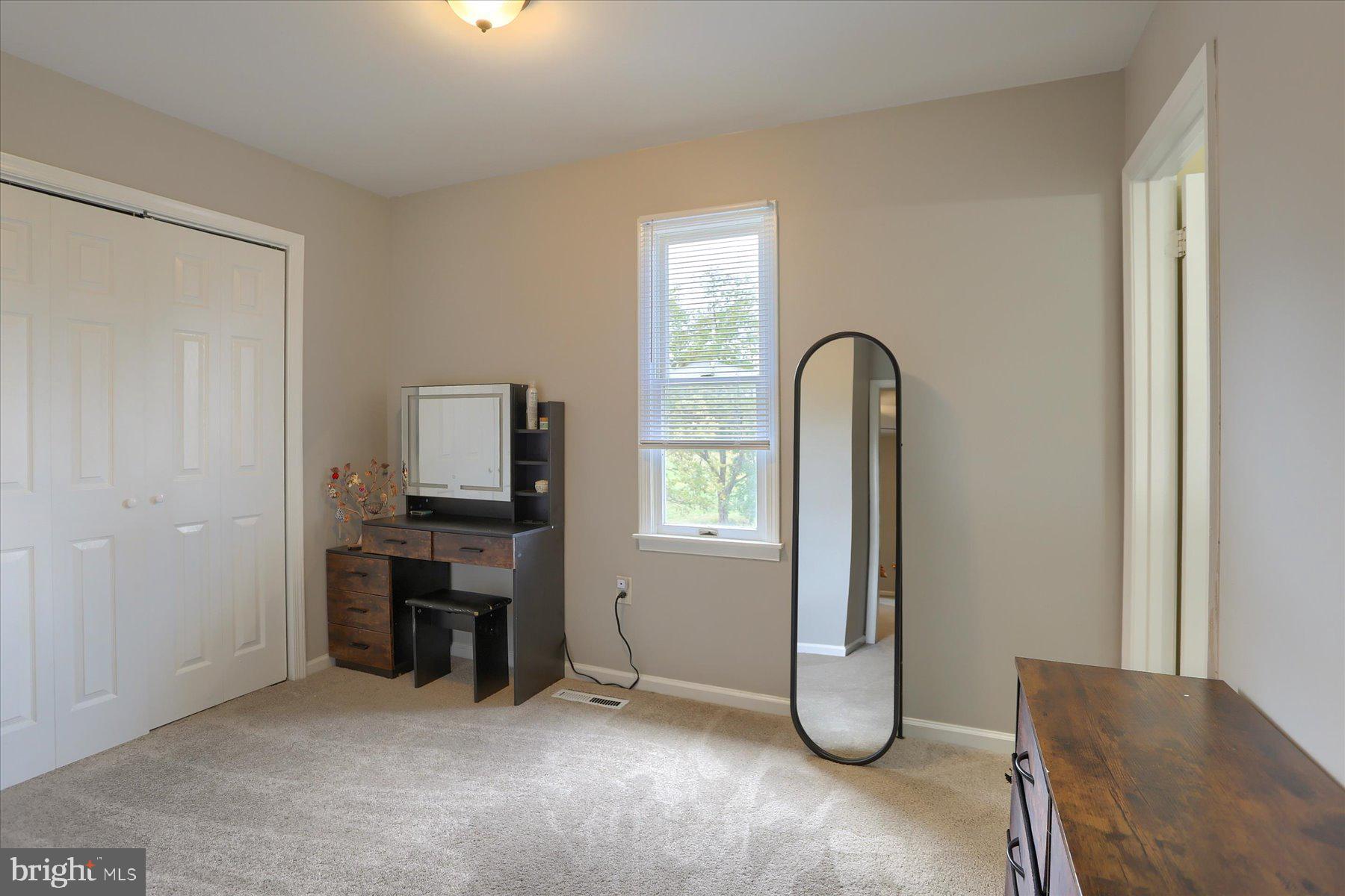 3704 Reichert Road Harrisburg, PA 17110 - Photo 21 of 44 a view of work space with lounge chair and windows