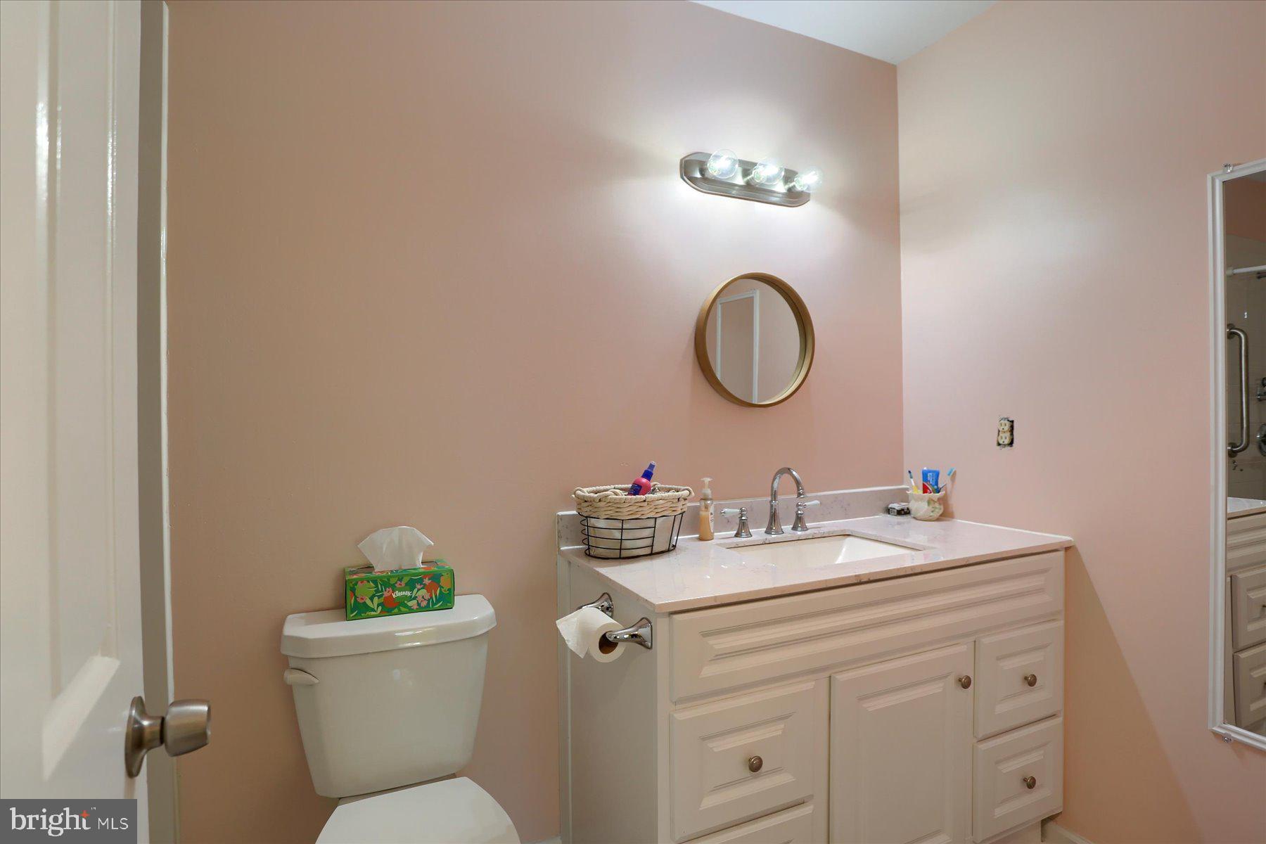 3704 Reichert Road Harrisburg, PA 17110 - Photo 24 of 44 a bathroom with a granite countertop toilet sink and mirror