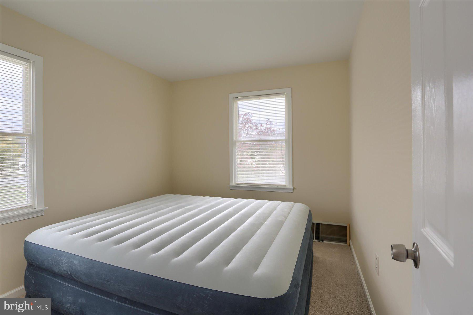 3704 Reichert Road Harrisburg, PA 17110 - Photo 31 of 44 a bedroom with a bed and a window