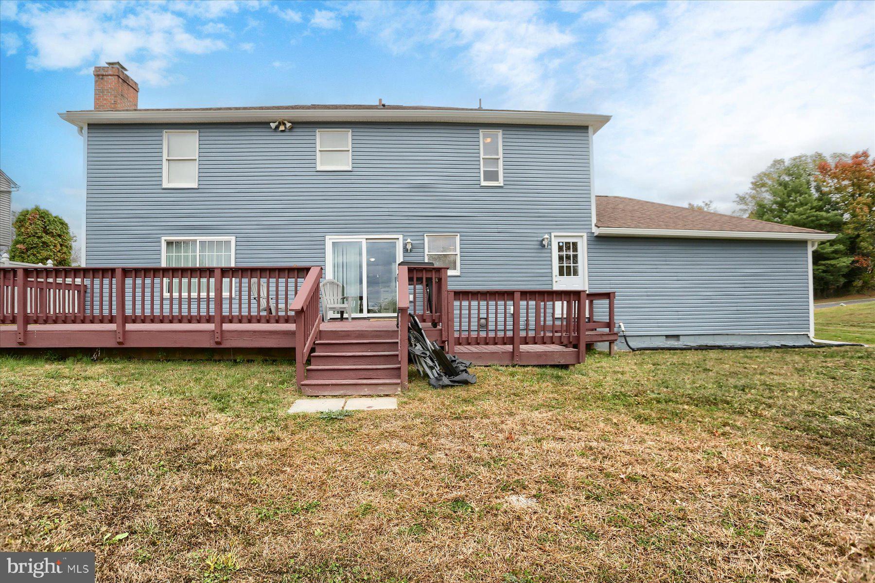 3704 Reichert Road Harrisburg, PA 17110 - Photo 41 of 44 a backyard of a house with yard and deck