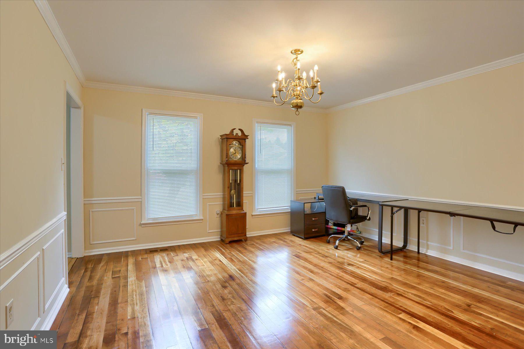 3704 Reichert Road Harrisburg, PA 17110 - Photo 6 of 44 a view of a room with wooden floor and large windows
