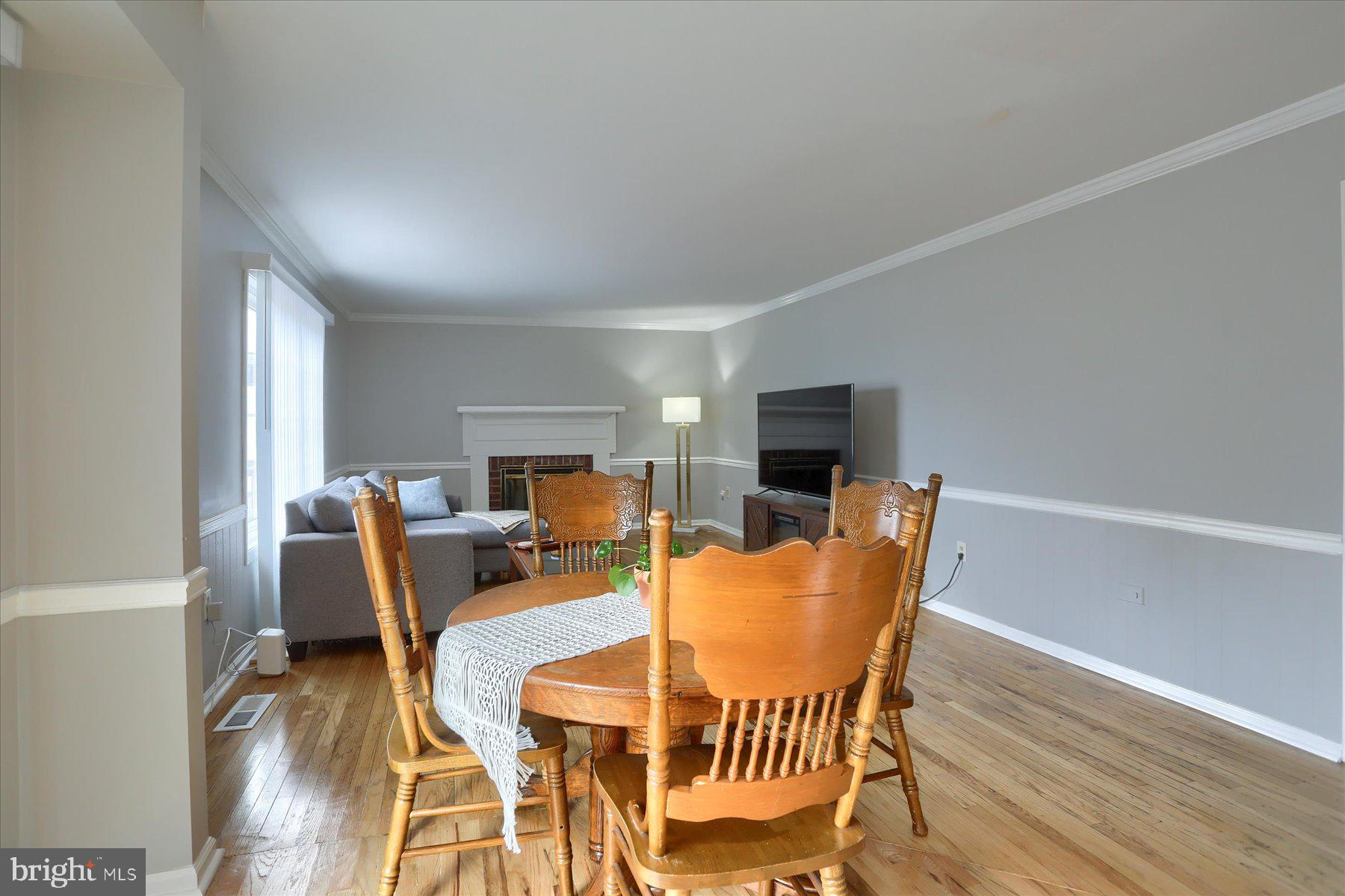 3704 Reichert Road Harrisburg, PA 17110 - Photo 10 of 44 a dining room with furniture and wooden floor