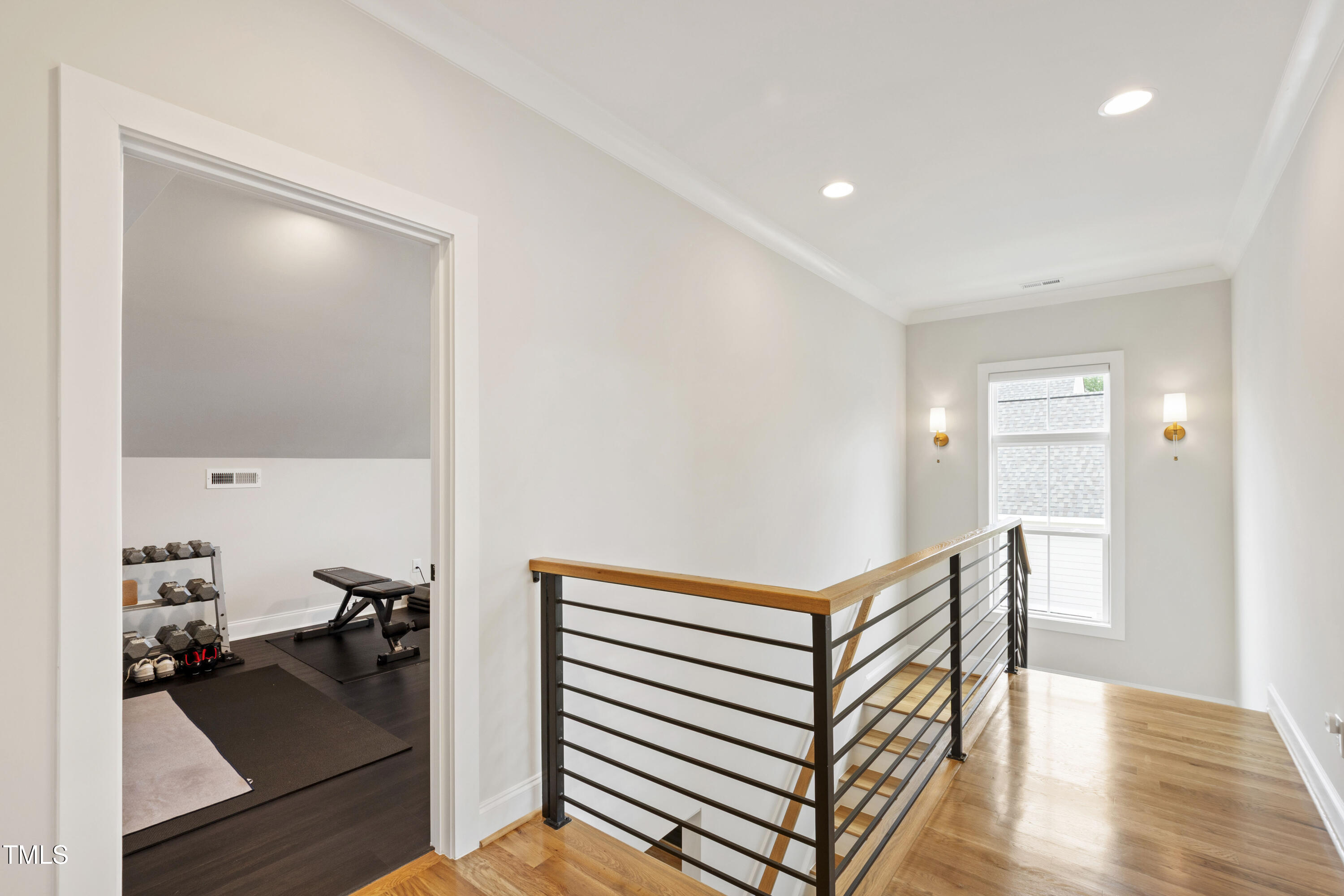 912 Lily Claire Lane Fuquay-Varina, NC 27526 - Photo 35 of 64 a very nice looking room with wooden floor