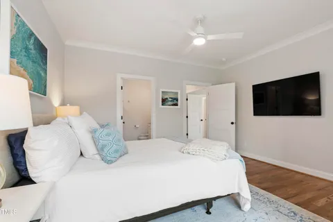 a view of a house with a backyard porch and sitting area