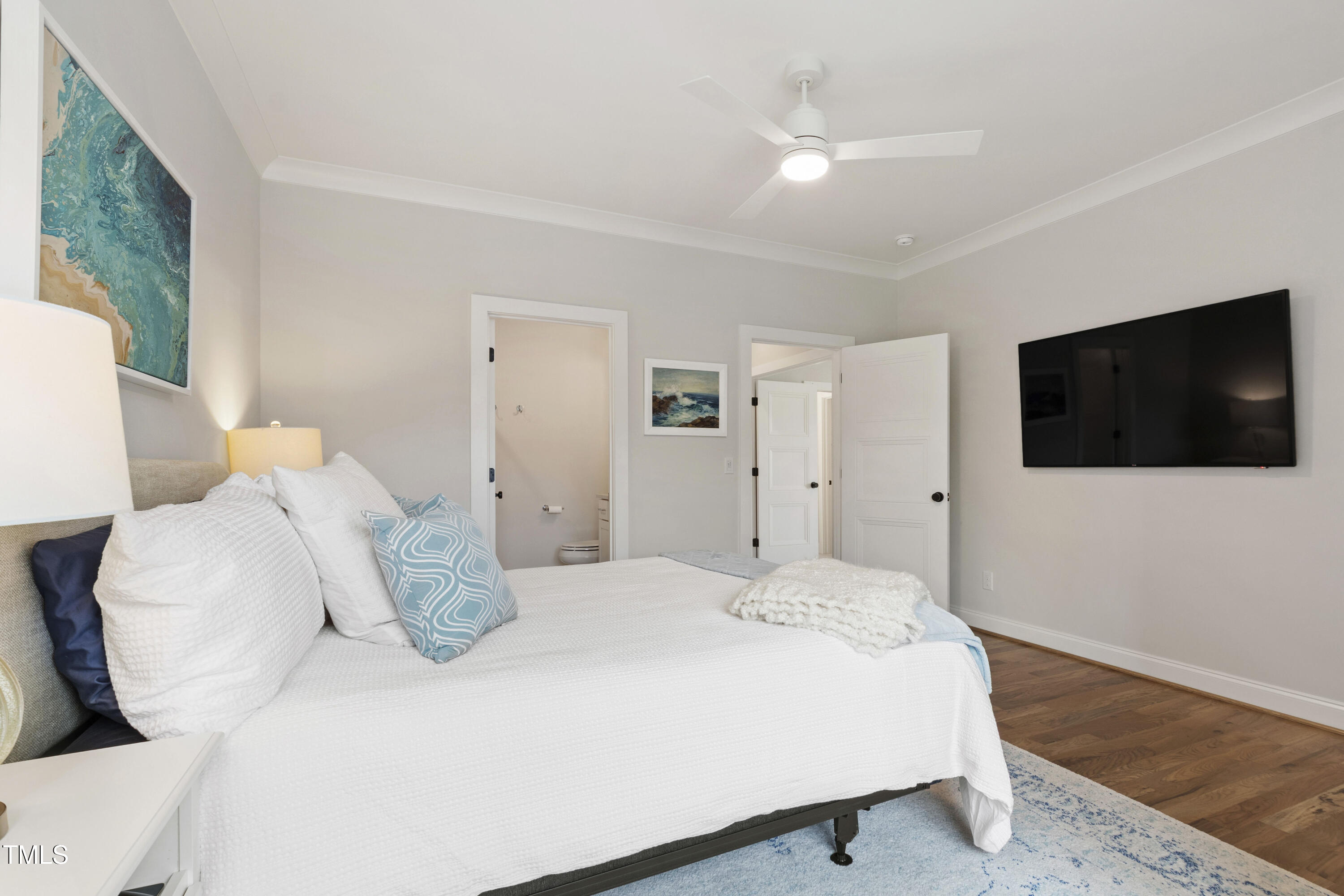 912 Lily Claire Lane Fuquay-Varina, NC 27526 - Photo 44 of 64 a large white bed in a white room