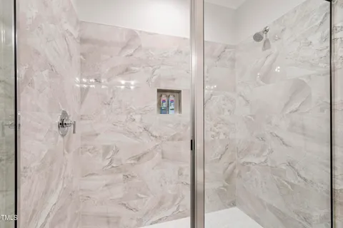 a view of a house with more windows and plants