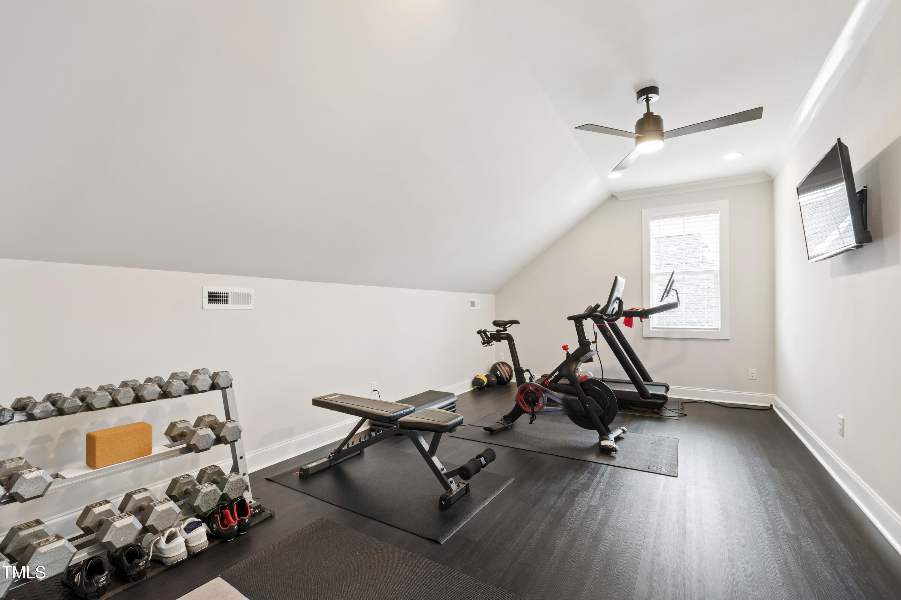 912 Lily Claire Lane Fuquay-Varina, NC 27526 - Photo 47 of 64 a view of a room with gym equipment