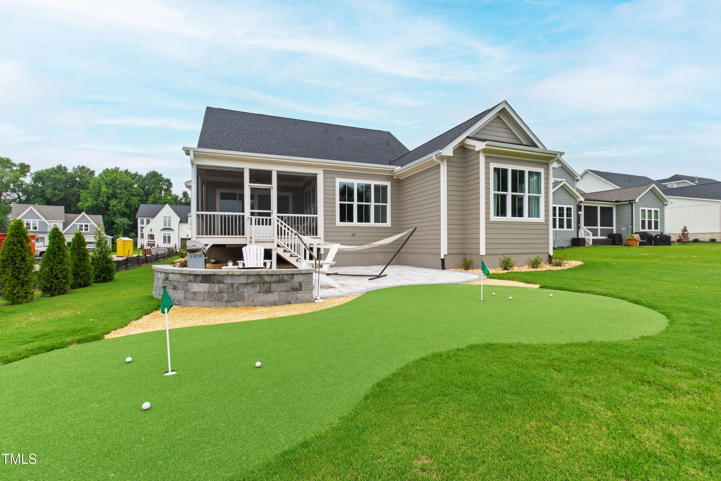 912 Lily Claire Lane Fuquay-Varina, NC 27526 - Photo 51 of 64 a front view of house with yard and green space