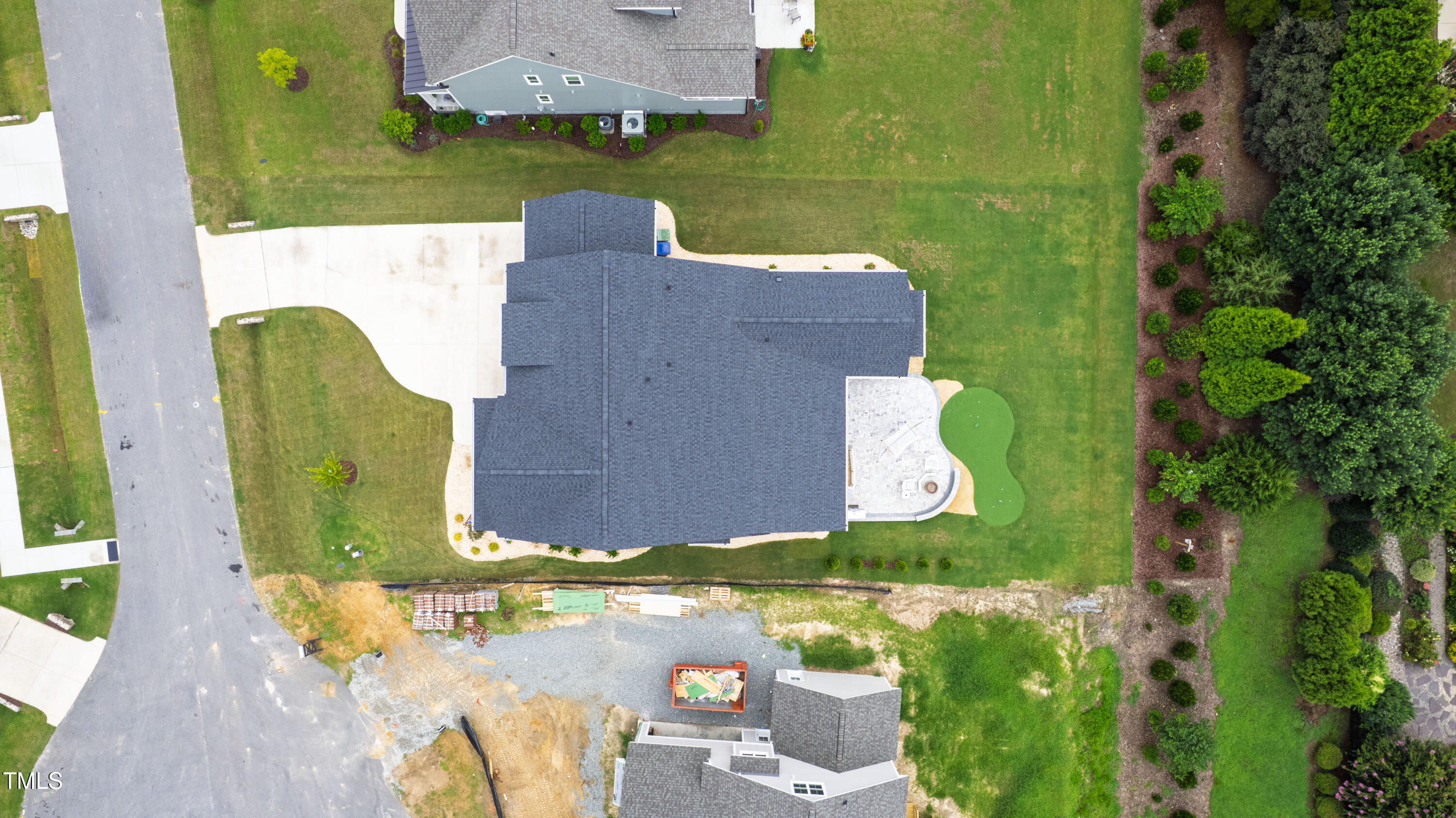 912 Lily Claire Lane Fuquay-Varina, NC 27526 - Photo 57 of 64 an aerial view of a house with a swimming pool yard and outdoor seating