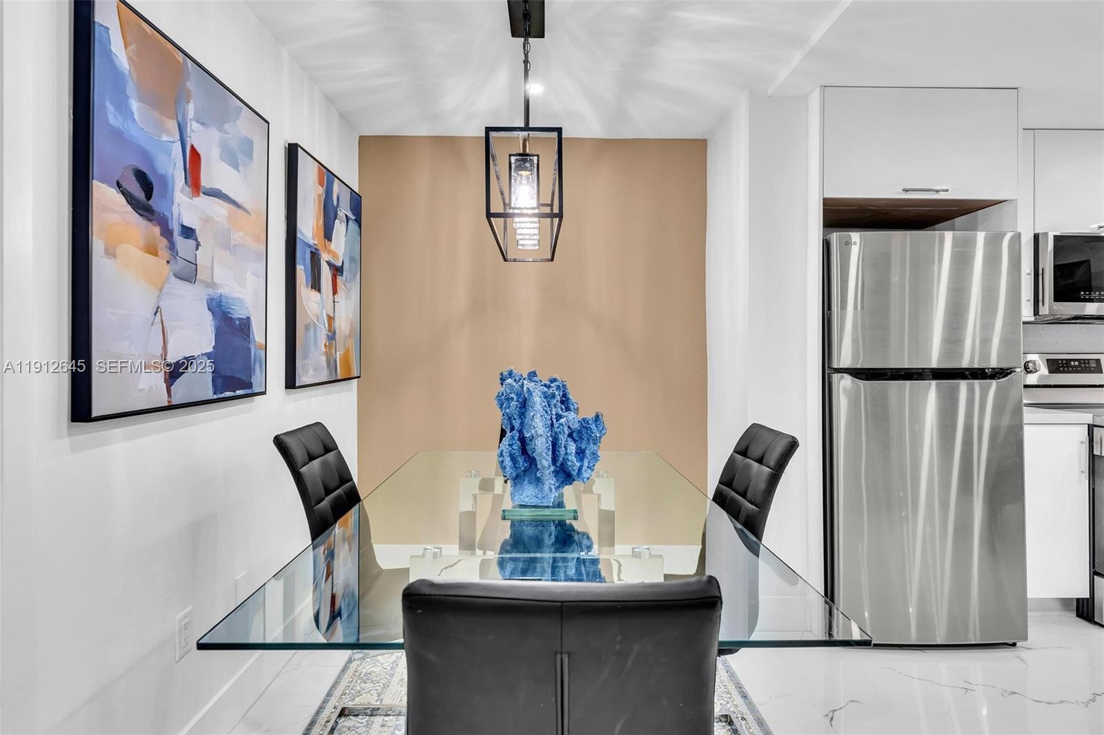 923 Northwest 110th Street, Unit A Miami, FL 33168 - Photo 14 of 21 a view of a dining room with furniture