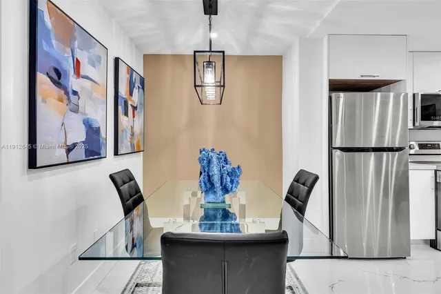 a view of a dining room with furniture