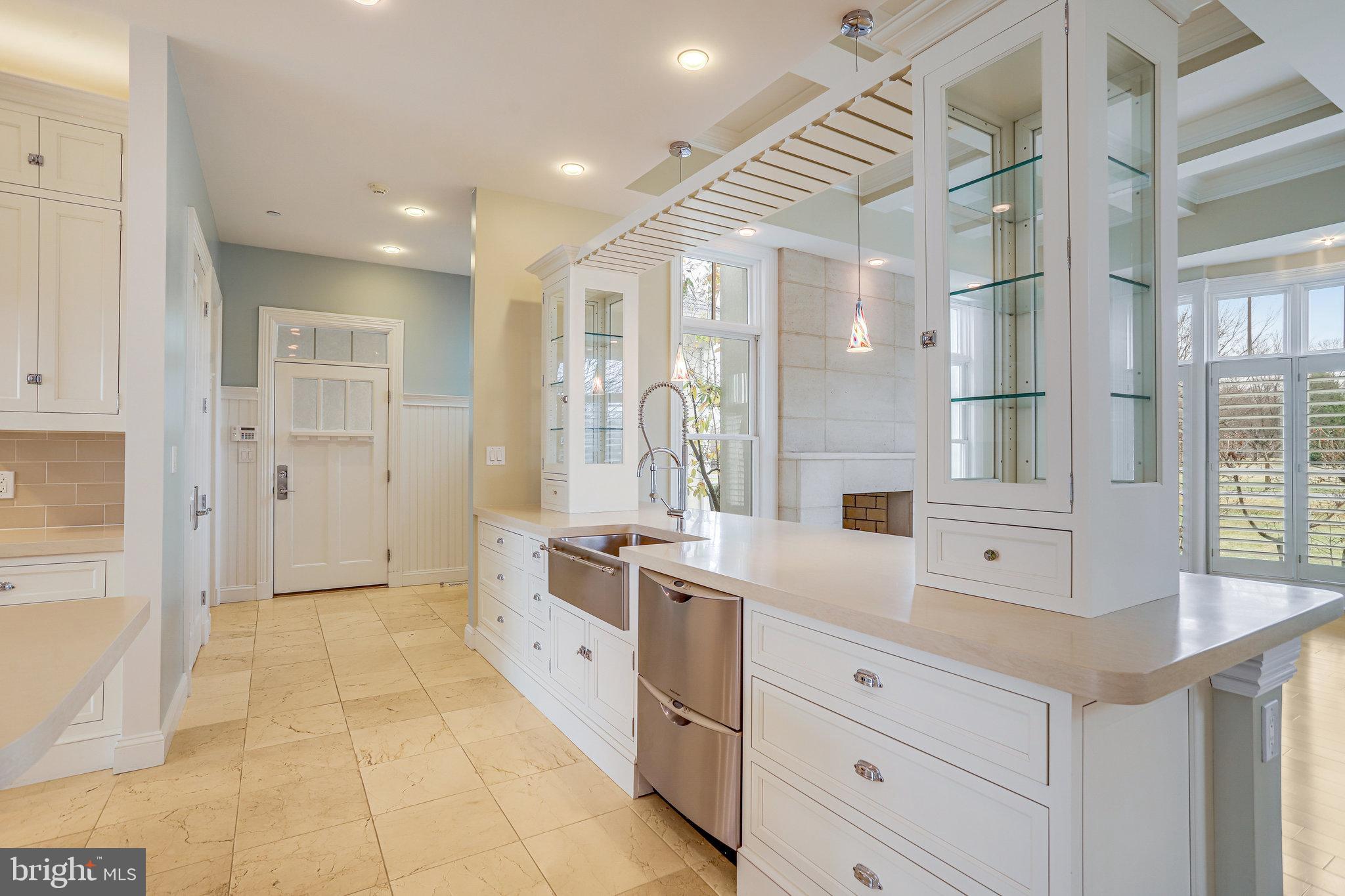 21612 Ripplemead Drive Gaithersburg, MD 20882 - Photo 11 of 39 a large white kitchen with a large window