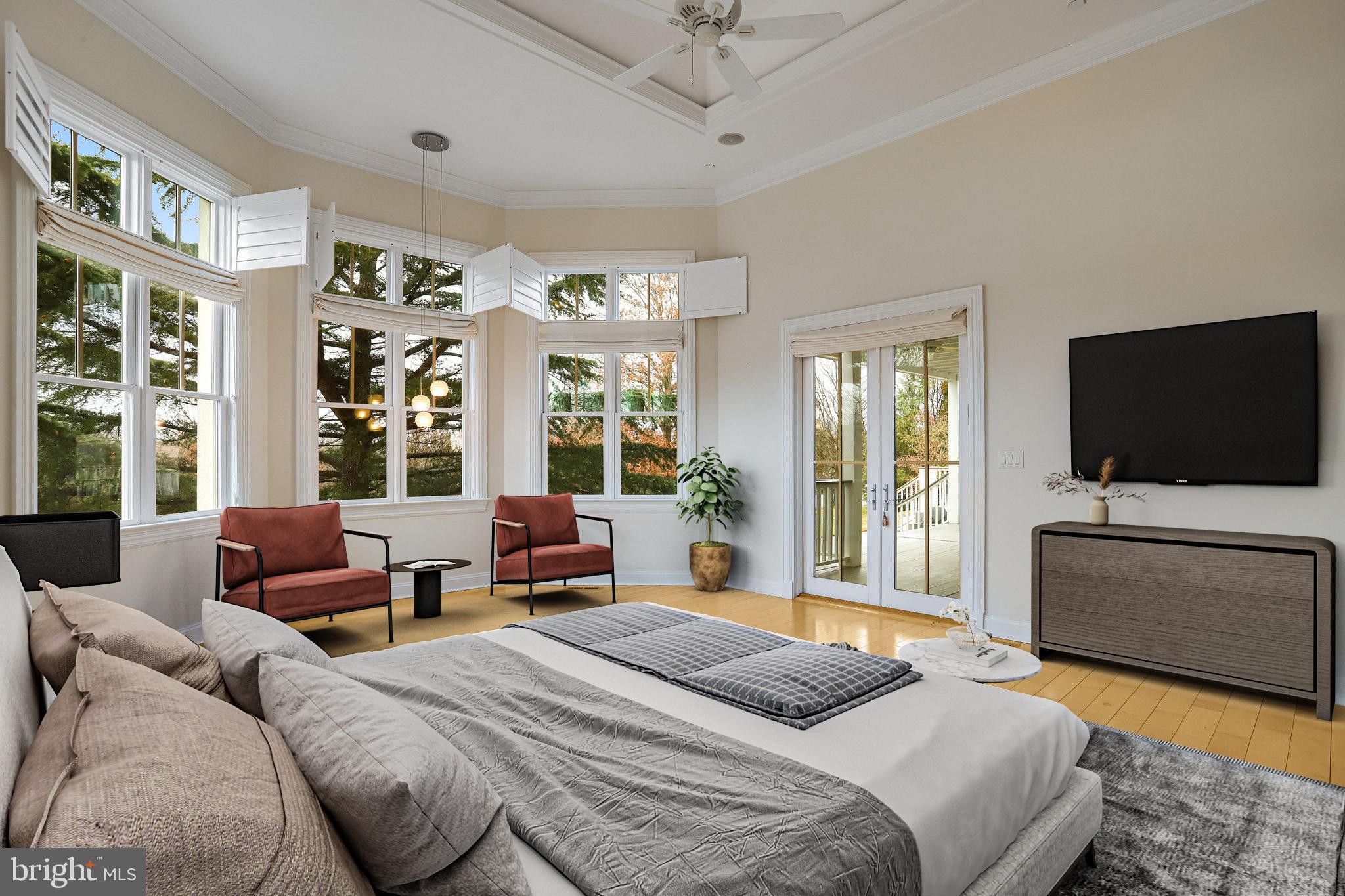 21612 Ripplemead Drive Gaithersburg, MD 20882 - Photo 13 of 39 a bedroom with a bed and a flat screen tv