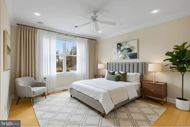 a bedroom with a bed and a couch