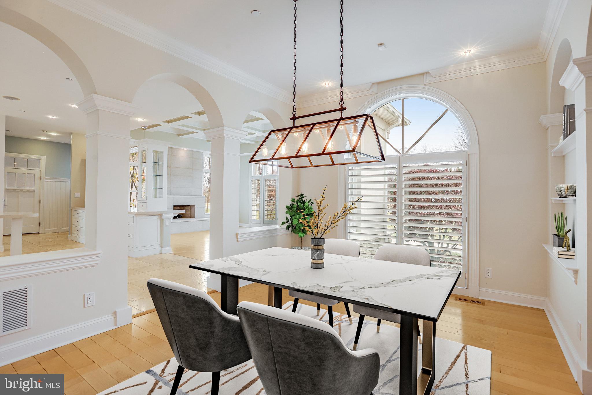 21612 Ripplemead Drive Gaithersburg, MD 20882 - Photo 3 of 39 a view of a dining room with furniture window and wooden floor