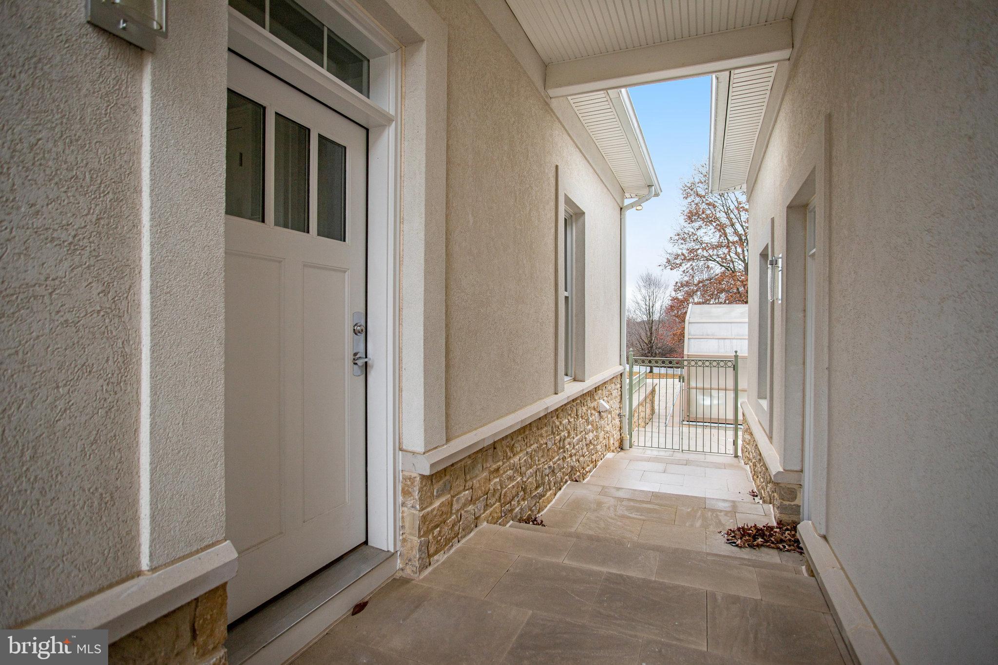 21612 Ripplemead Drive Gaithersburg, MD 20882 - Photo 32 of 39 a view of a hallway with wooden floor and windows
