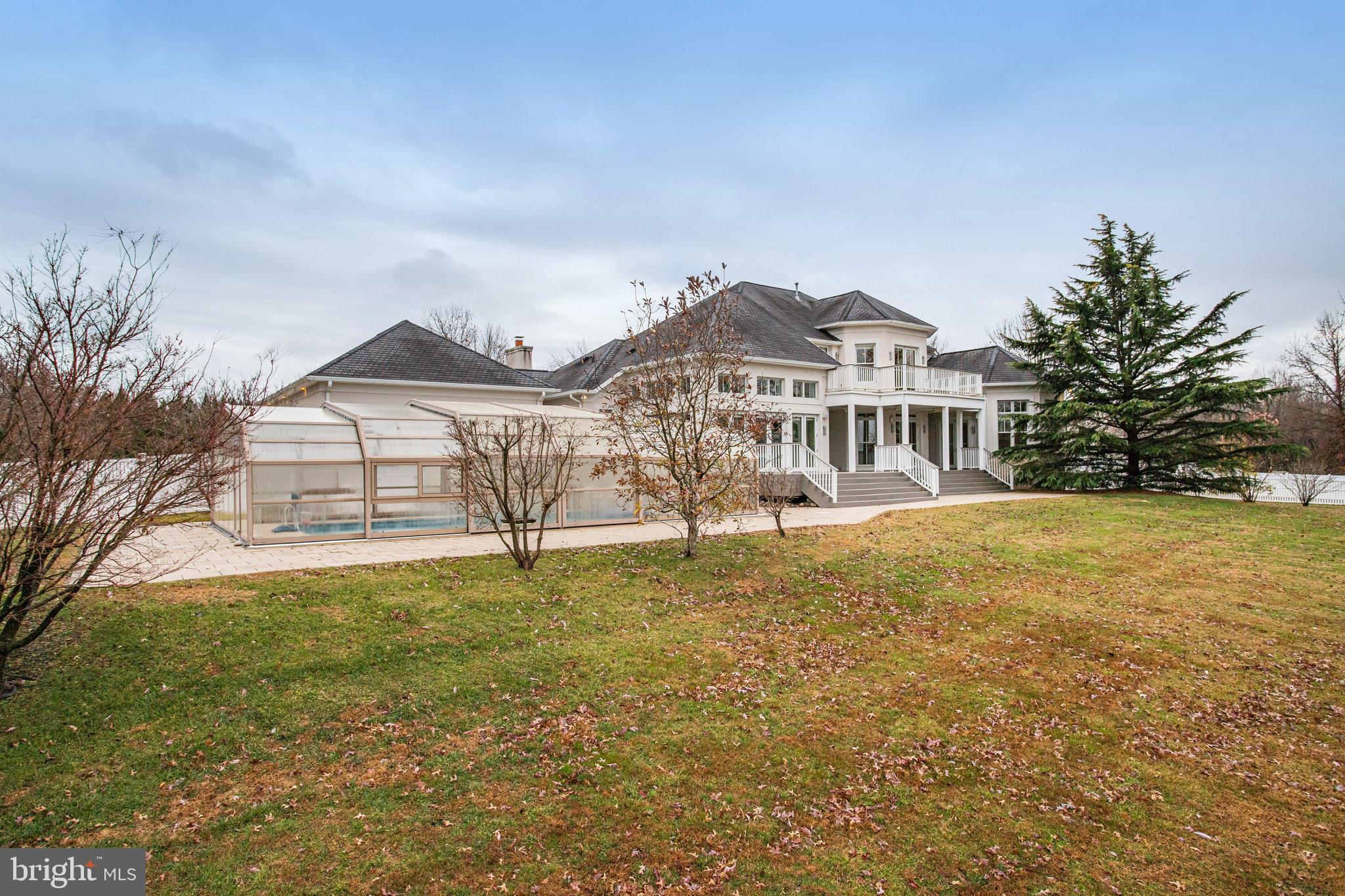 21612 Ripplemead Drive Gaithersburg, MD 20882 - Photo 38 of 39 a house with swimming pool in front of it