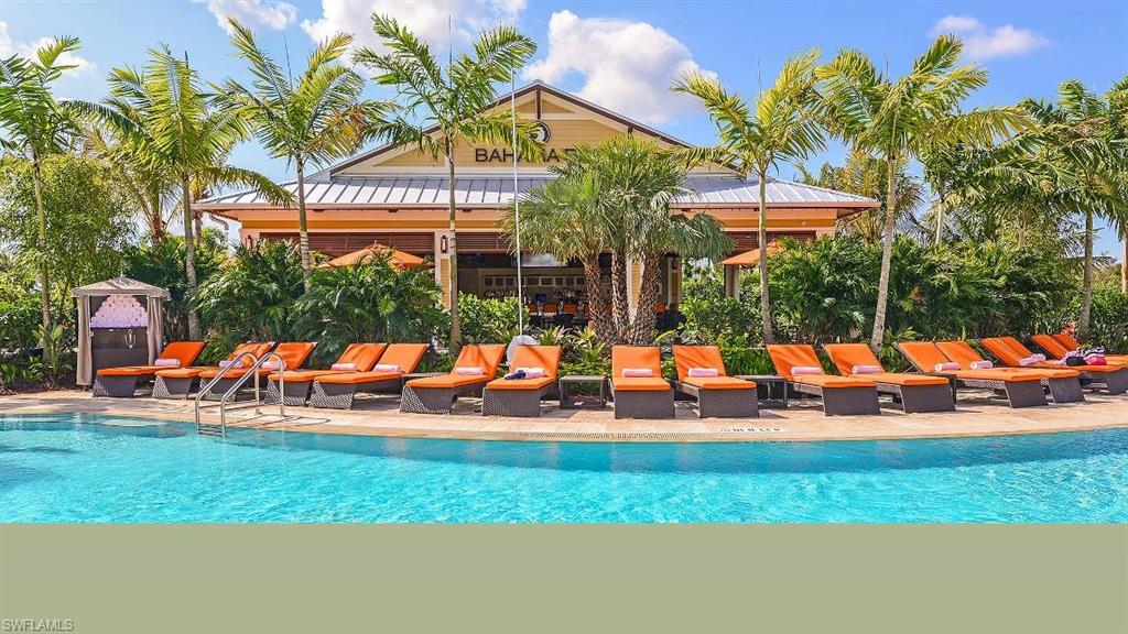 9451 Montelanico Loop Naples, FL 34119 - Photo 15 of 15 an outdoor space with tables and chairs