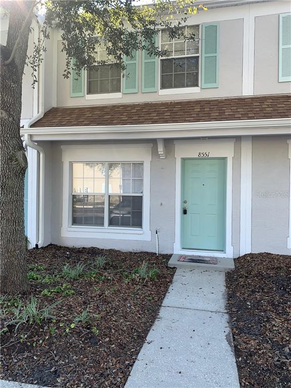 8551 Hunters Key Circle Tampa, FL 33647 - Photo 1 of 1 a front view of a house with a yard