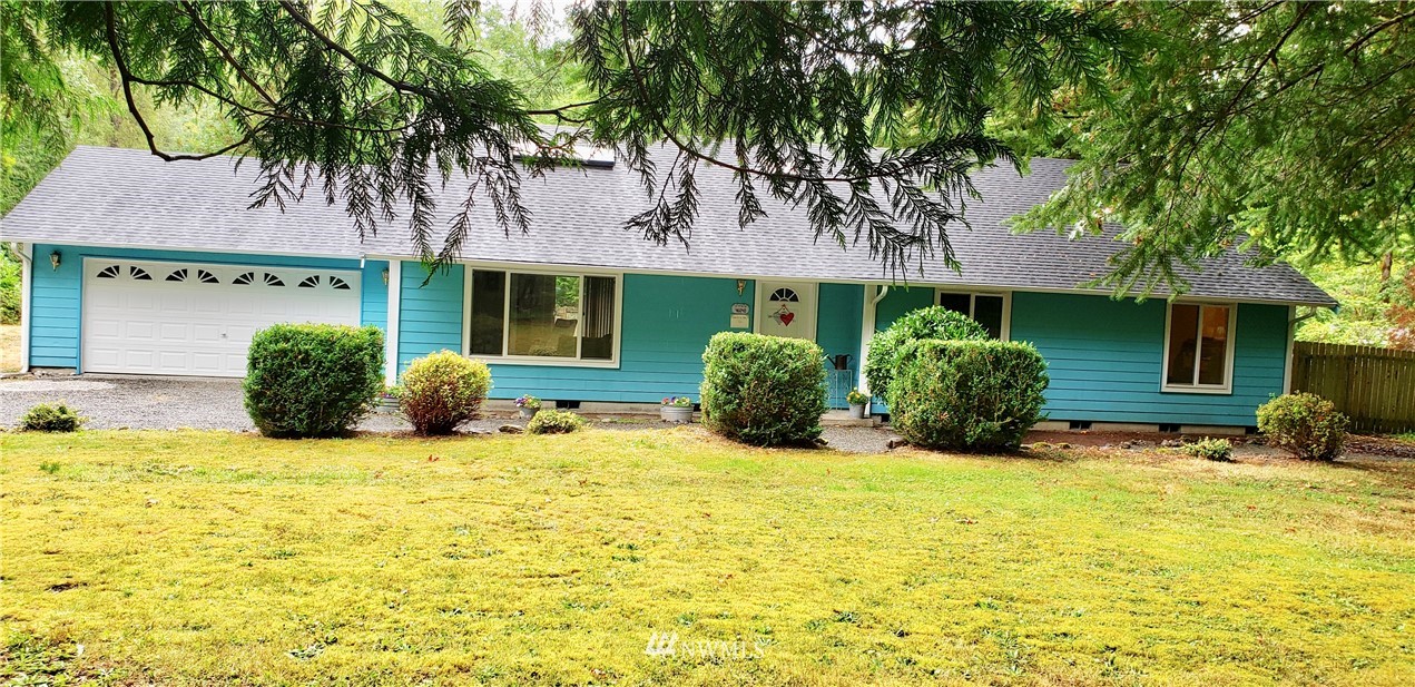 46040 Southeast Edgewick Road North Bend, WA 98045 - Photo 1 of 19 a view of a house with a yard and potted plants