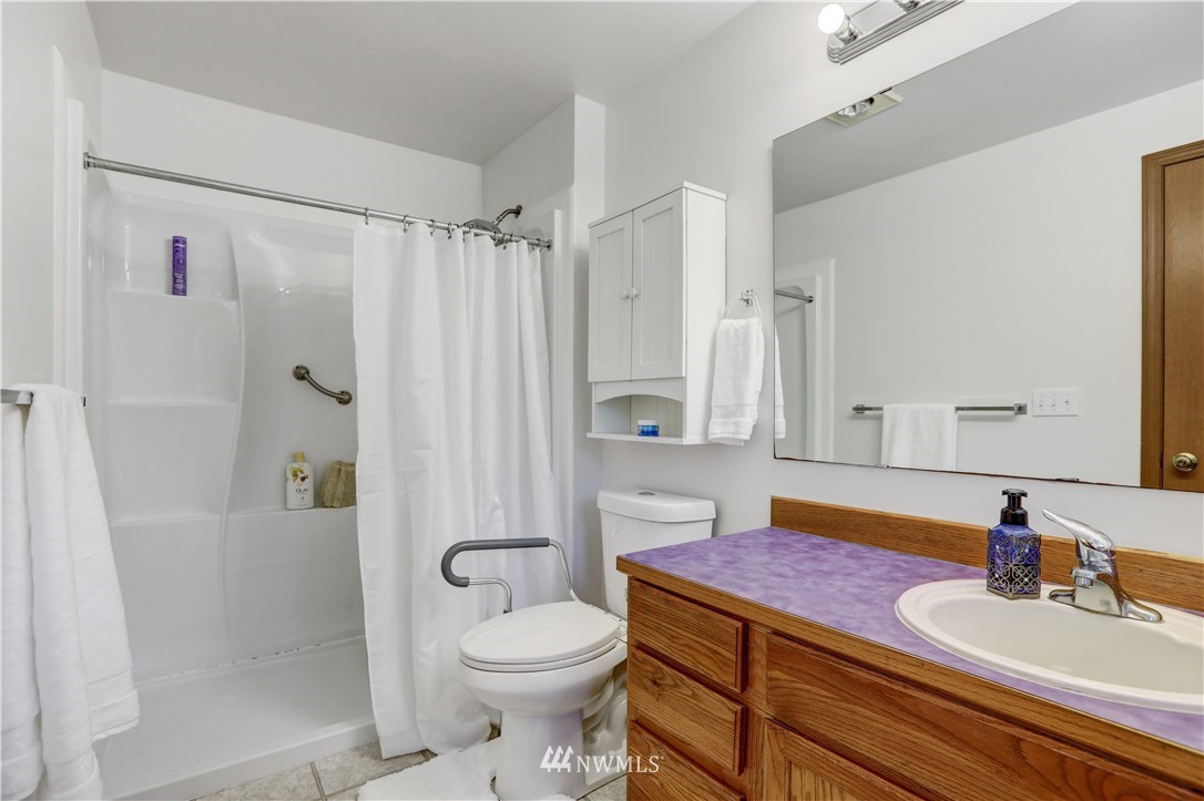 46040 Southeast Edgewick Road North Bend, WA 98045 - Photo 13 of 19 a bathroom with a sink a toilet and shower