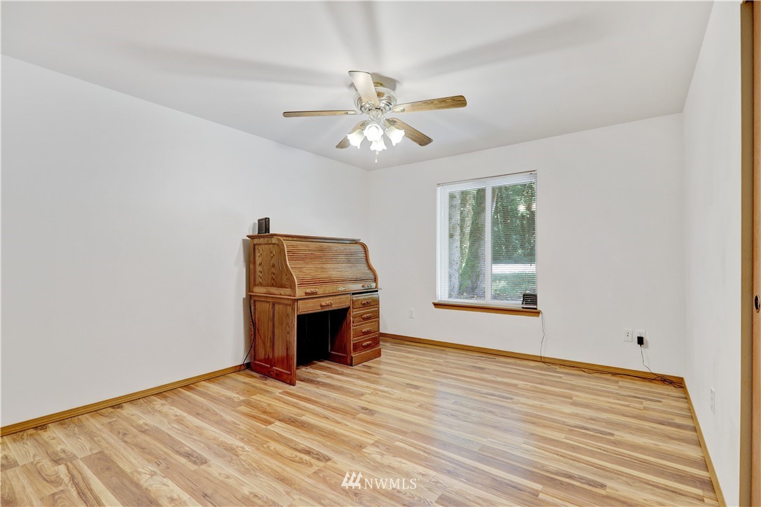 46040 Southeast Edgewick Road North Bend, WA 98045 - Photo 15 of 19 a view of empty room with wooden floor and fan
