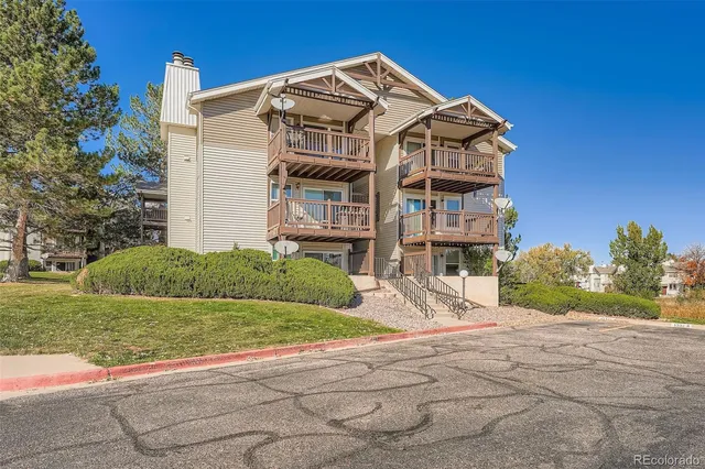 a view of balcony with wooden floor