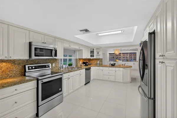 a view of a livingroom with furniture and window