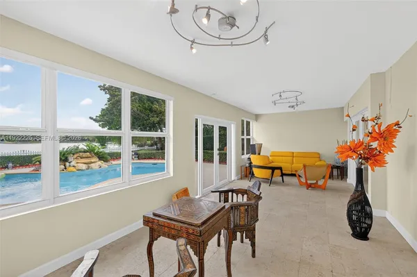 a workspace with furniture and a window