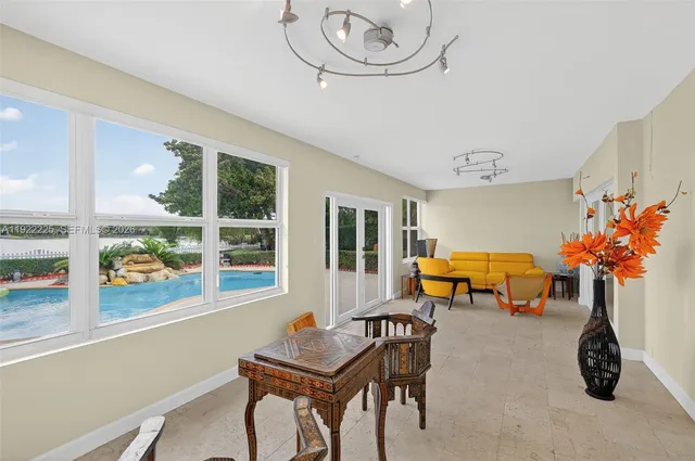 a workspace with furniture and a window