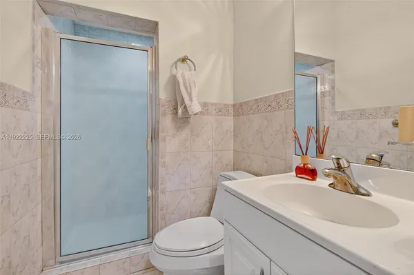 a view of kitchen with wooden floor and window