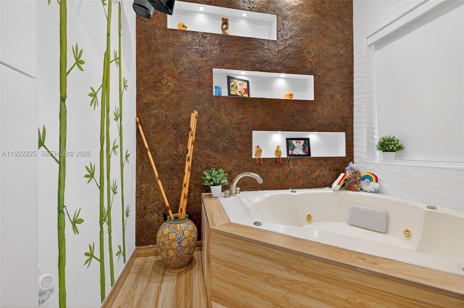 9261 Southwest 88th Street Miami, FL 33173 - Photo 32 of 55 a bathroom with a tub and a sink