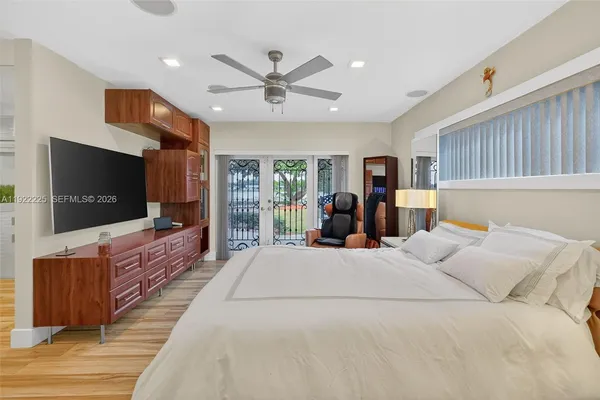 a bathroom with a sink a mirror and a shower curtain