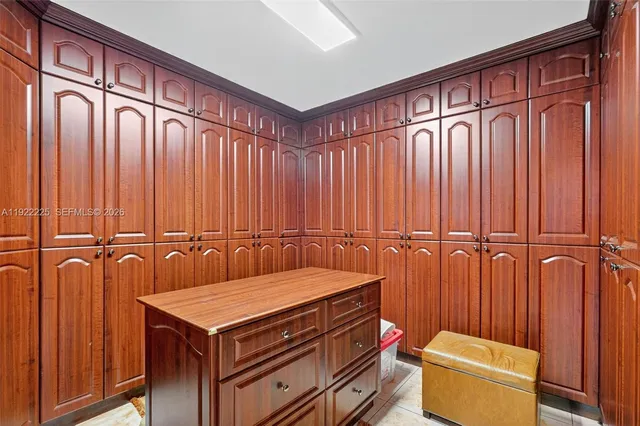 a view of a swimming pool with lounge chair