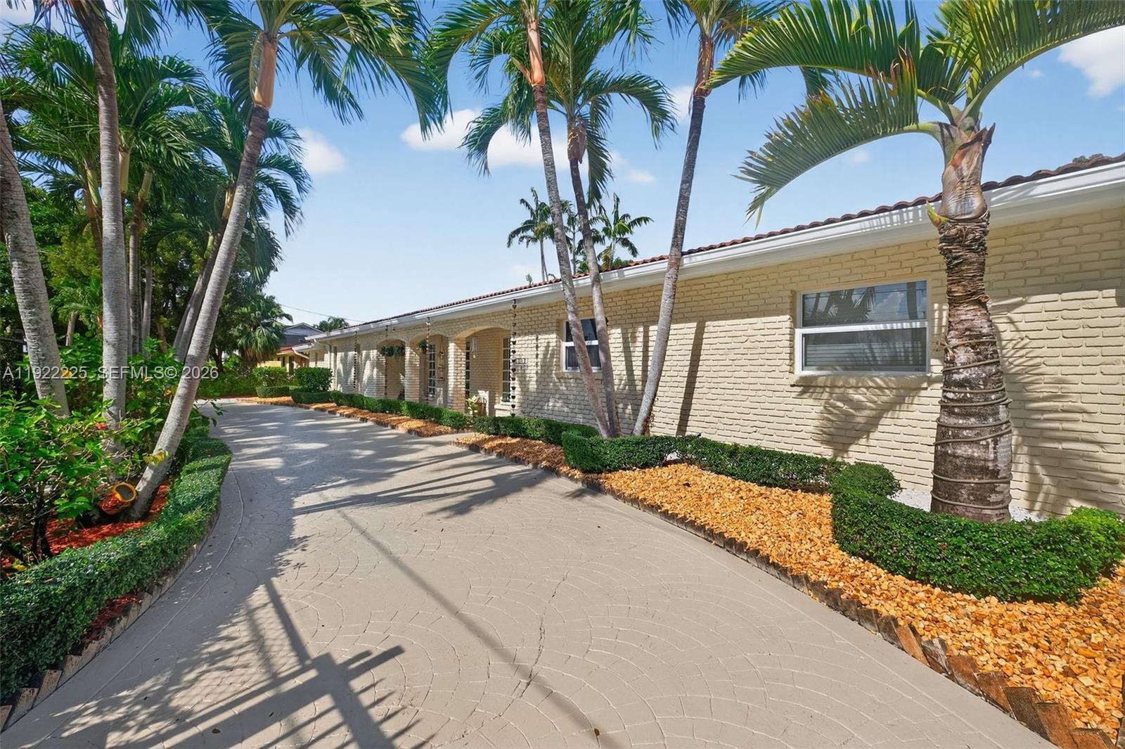 9261 Southwest 88th Street Miami, FL 33173 - Photo 46 of 55 a view of a backyard with palm trees