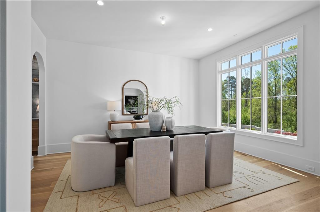 10210 Cedar Ridge Drive Milton, GA 30004 - Photo 11 of 47 a living room with furniture and a window
