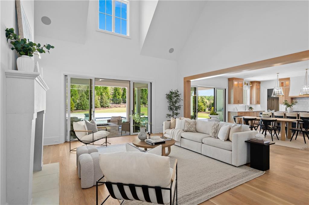 10210 Cedar Ridge Drive Milton, GA 30004 - Photo 23 of 47 a living room with furniture and a large window