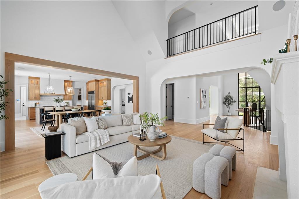 10210 Cedar Ridge Drive Milton, GA 30004 - Photo 25 of 47 a living room with furniture white walls and wooden floor