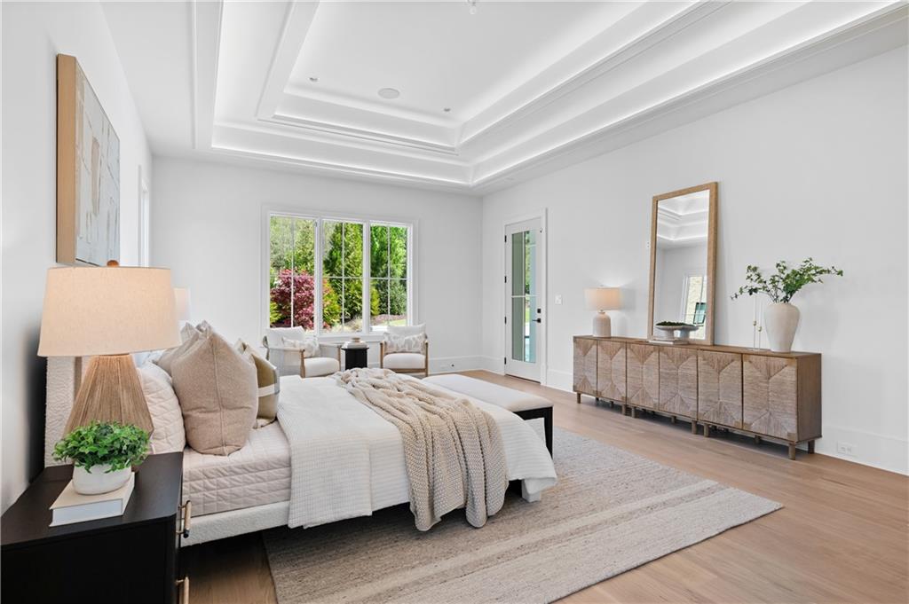 10210 Cedar Ridge Drive Milton, GA 30004 - Photo 26 of 47 a bedroom with a bed and a window