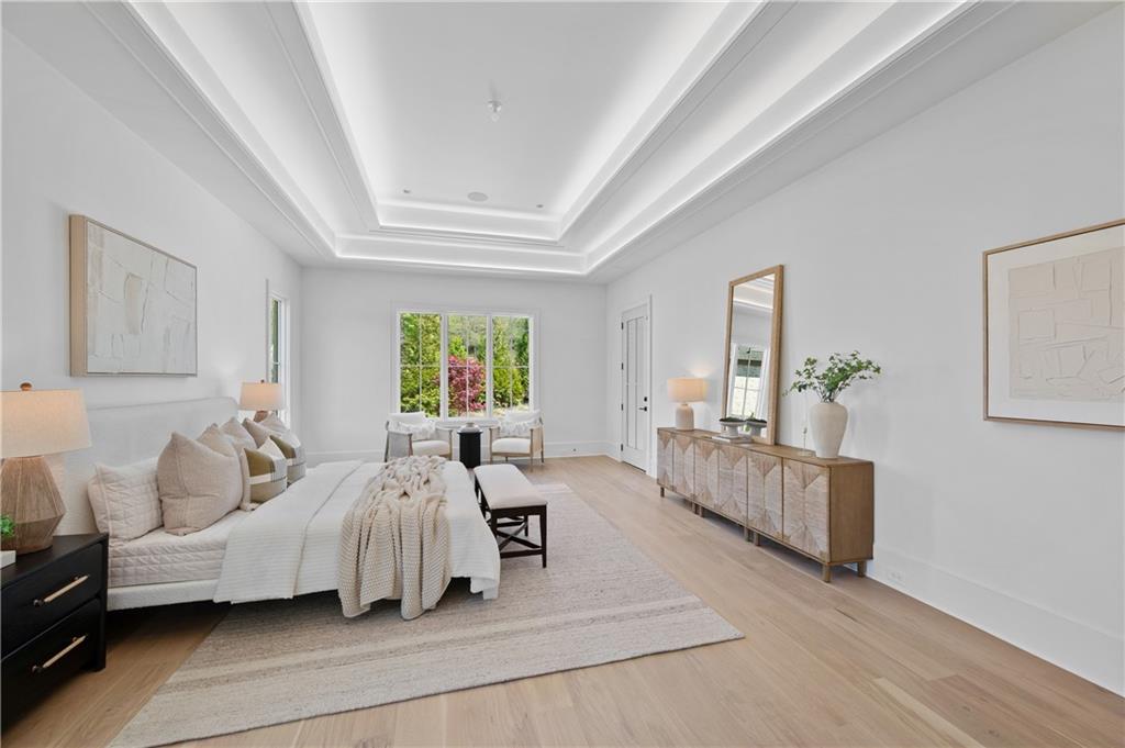 10210 Cedar Ridge Drive Milton, GA 30004 - Photo 28 of 47 a bed room with furniture and a couch