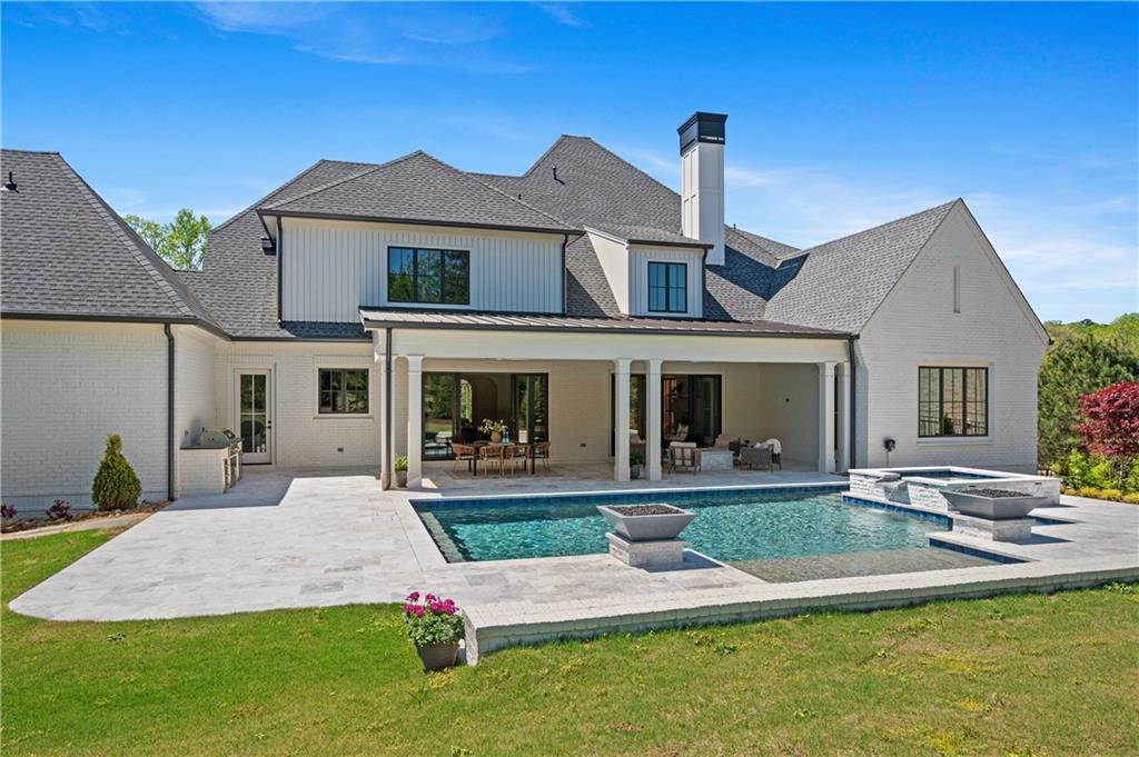 10210 Cedar Ridge Drive Milton, GA 30004 - Photo 43 of 47 a front view of a house with a yard