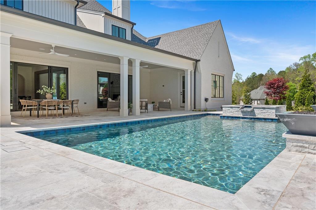 10210 Cedar Ridge Drive Milton, GA 30004 - Photo 44 of 47 a view of a house with outdoor kitchen