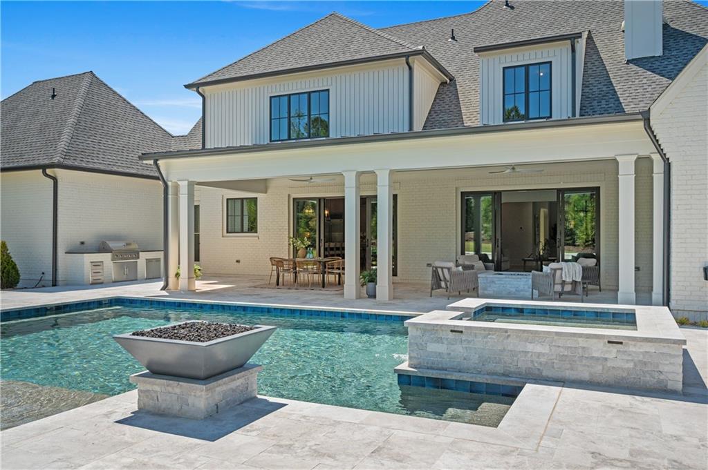 10210 Cedar Ridge Drive Milton, GA 30004 - Photo 45 of 47 a view of a house with backyard and porch