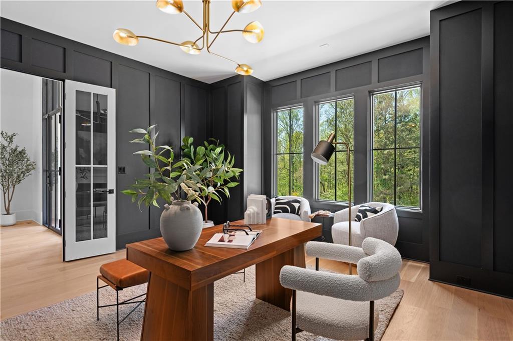 10210 Cedar Ridge Drive Milton, GA 30004 - Photo 8 of 47 a living room with furniture potted plant and a large window