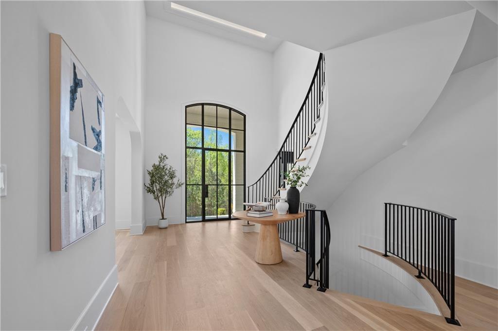 10210 Cedar Ridge Drive Milton, GA 30004 - Photo 10 of 47 a view of entryway and hall with wooden floor