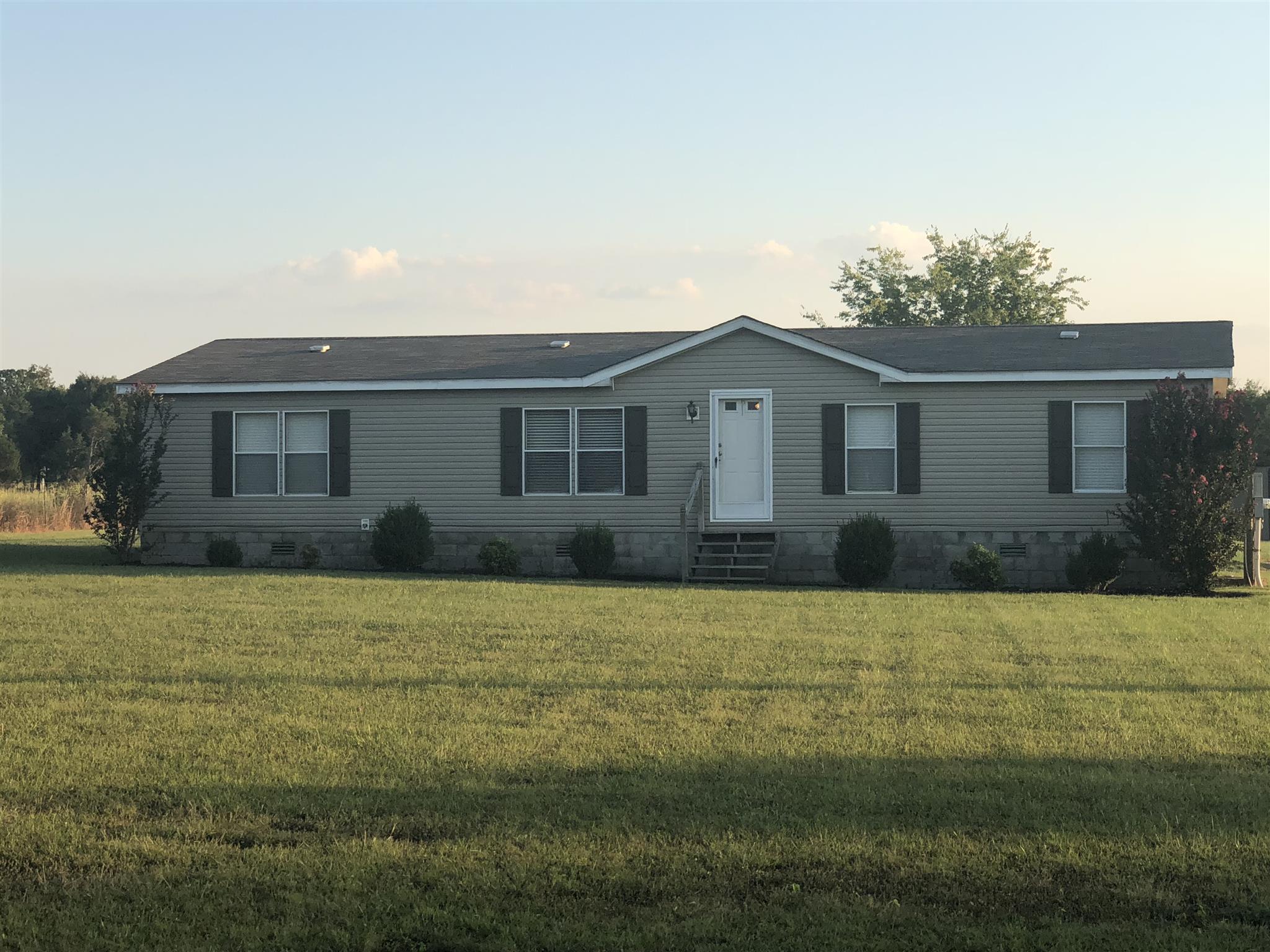 3692 Gwynn Road Lebanon, TN 37090 - Photo 1 of 10 a front view of a house with a yard